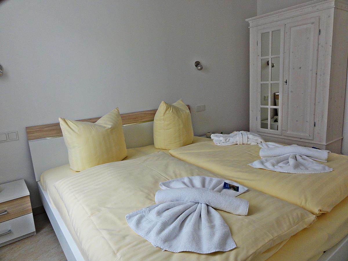 3 Zimmer Ferienwohnung Haus Meeresblick Mit Meerblick A005 Mit Suedterrasse Und Strandkorb بابي المظهر الخارجي الصورة